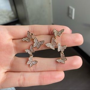 Urban Outfitters gold butterfly earrings